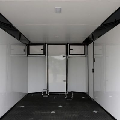 Impact Trailers | Blog Post | Featured Image | overhead-cabinets-close-aluminum-walls-2-motorcycle